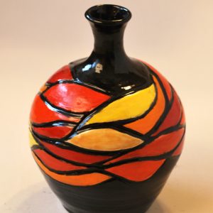 Bud Vase: Painted and Carved in Reds and Oranges with Black Background