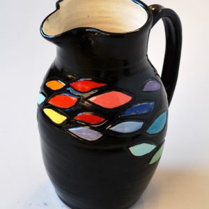 Carved and Painted Pitcher with Black Background.2