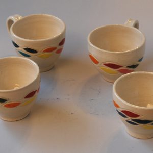 Carved and Painted Mugs