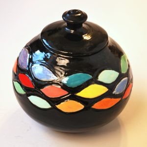 Carved and Painted Jar with Black Background.2